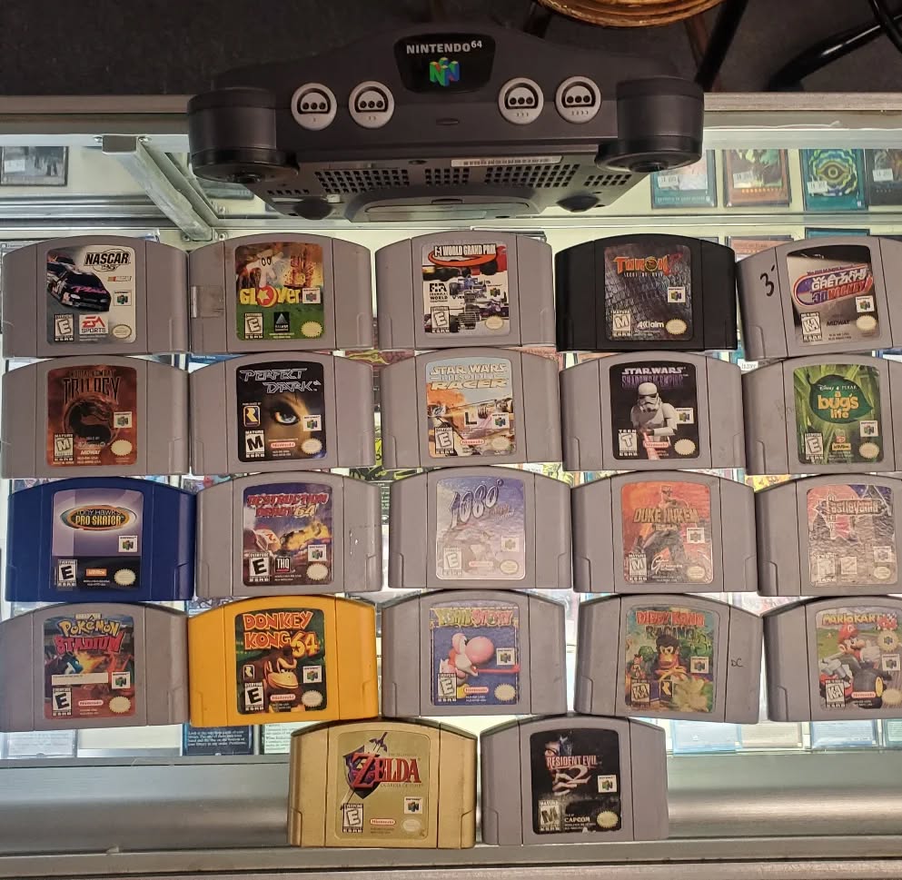 N64 console and classic cartridges including Zelda, Donkey Kong 64, and Mario Kart